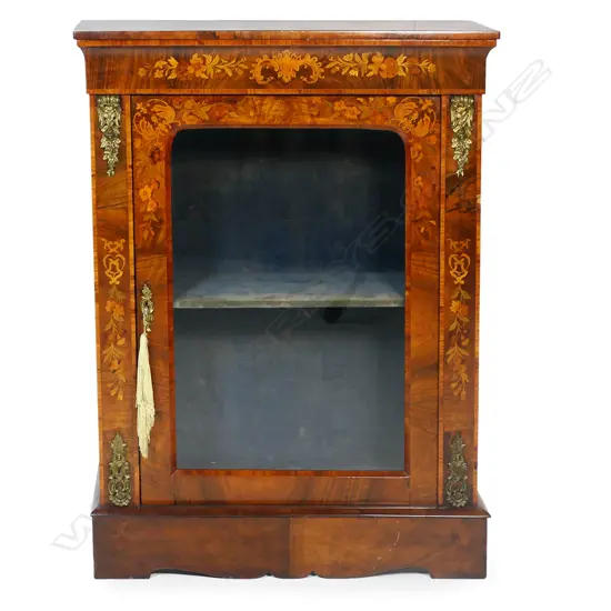 A 19thC walnut pier cabinet.