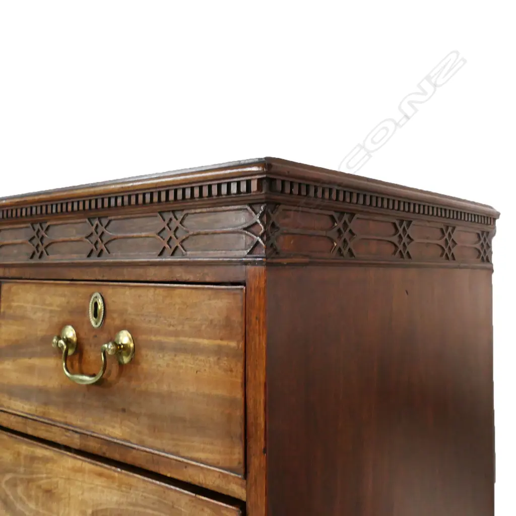 A Georgian mahogany chest on chest - the top of two half and two full width drawers, with fret work decoration to pediment, the base with three full width drawers, raised on bracket feet. 1030 x 540 x 1680mm. Image 1++
