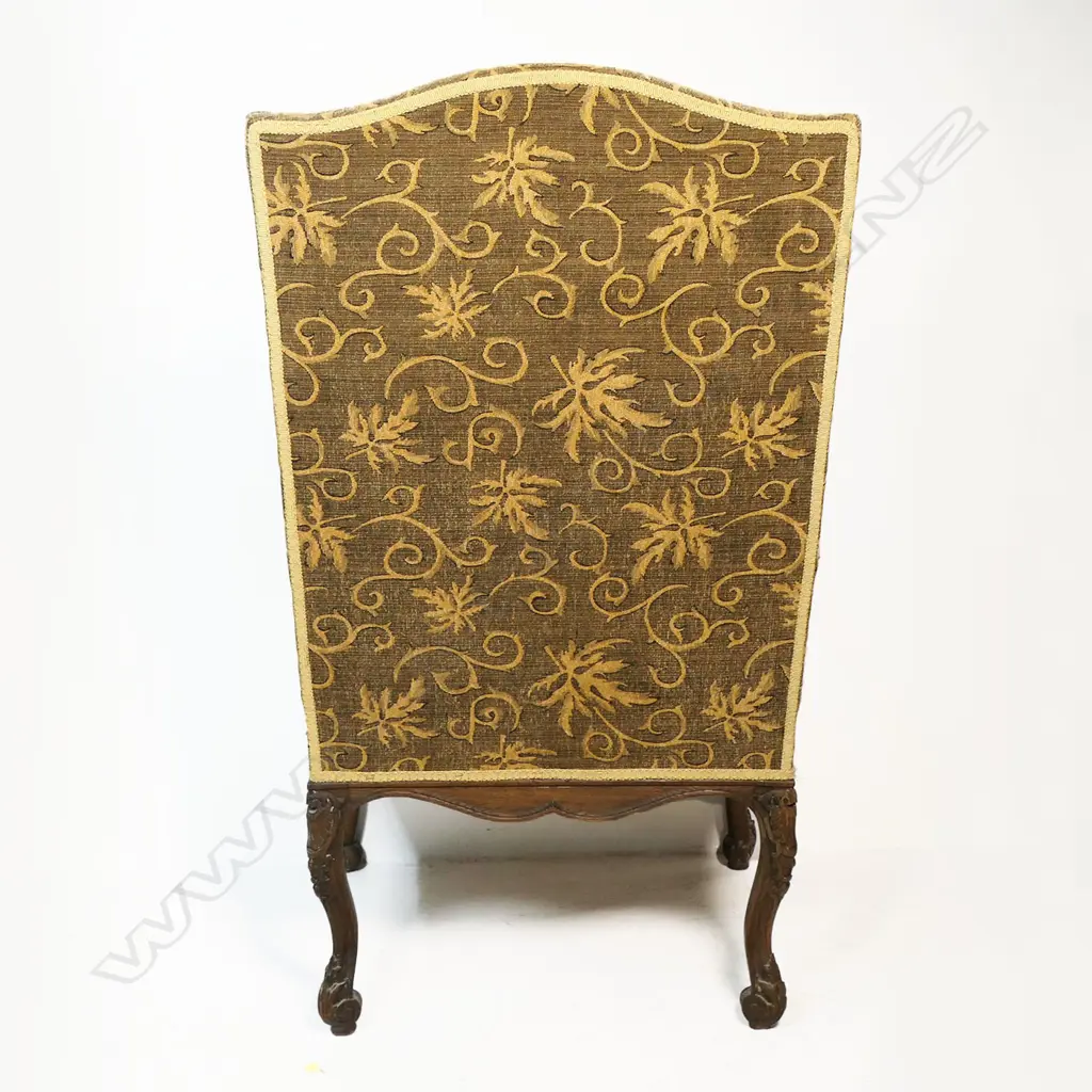 A 19thC oak baronial chair - carved oak frame upholstered in a self-patterned fabric. 730 x 800 x 1200mm. Image 1++