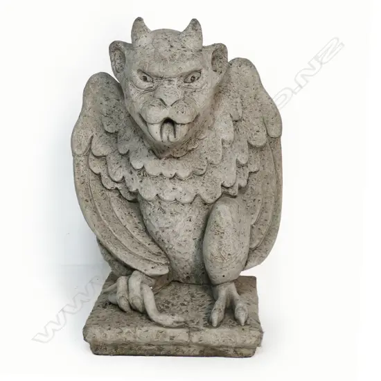 A concrete garden winged gargoyle - with snake clasped to its right foot. H.470mm.