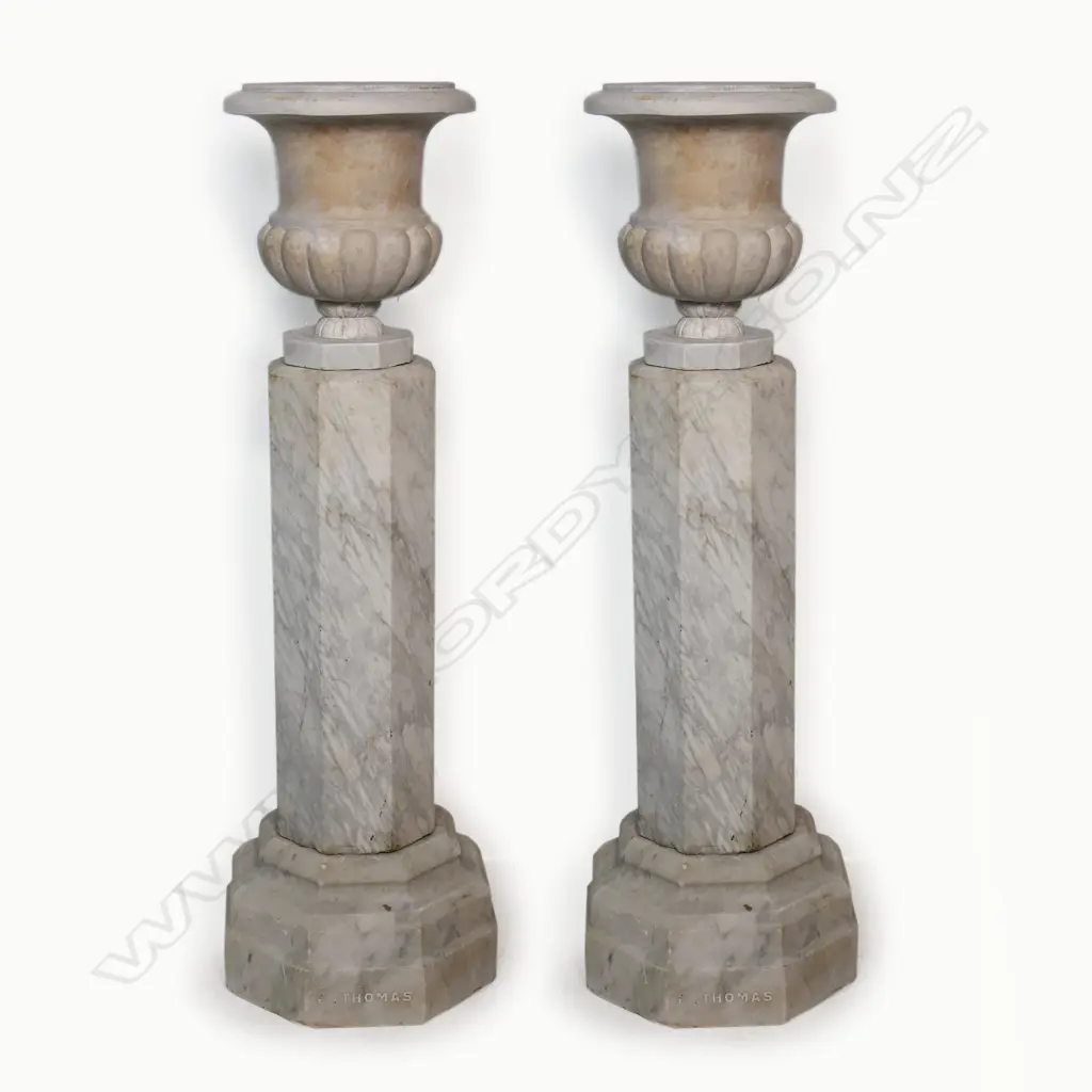 A pair of c.1900 Carrara marble tall pedestal based urns - of classical baluster form with octagonal foot on tall octagonal columns, further raised on octagonal stepped plinth base. H.1160mm, Image 1++