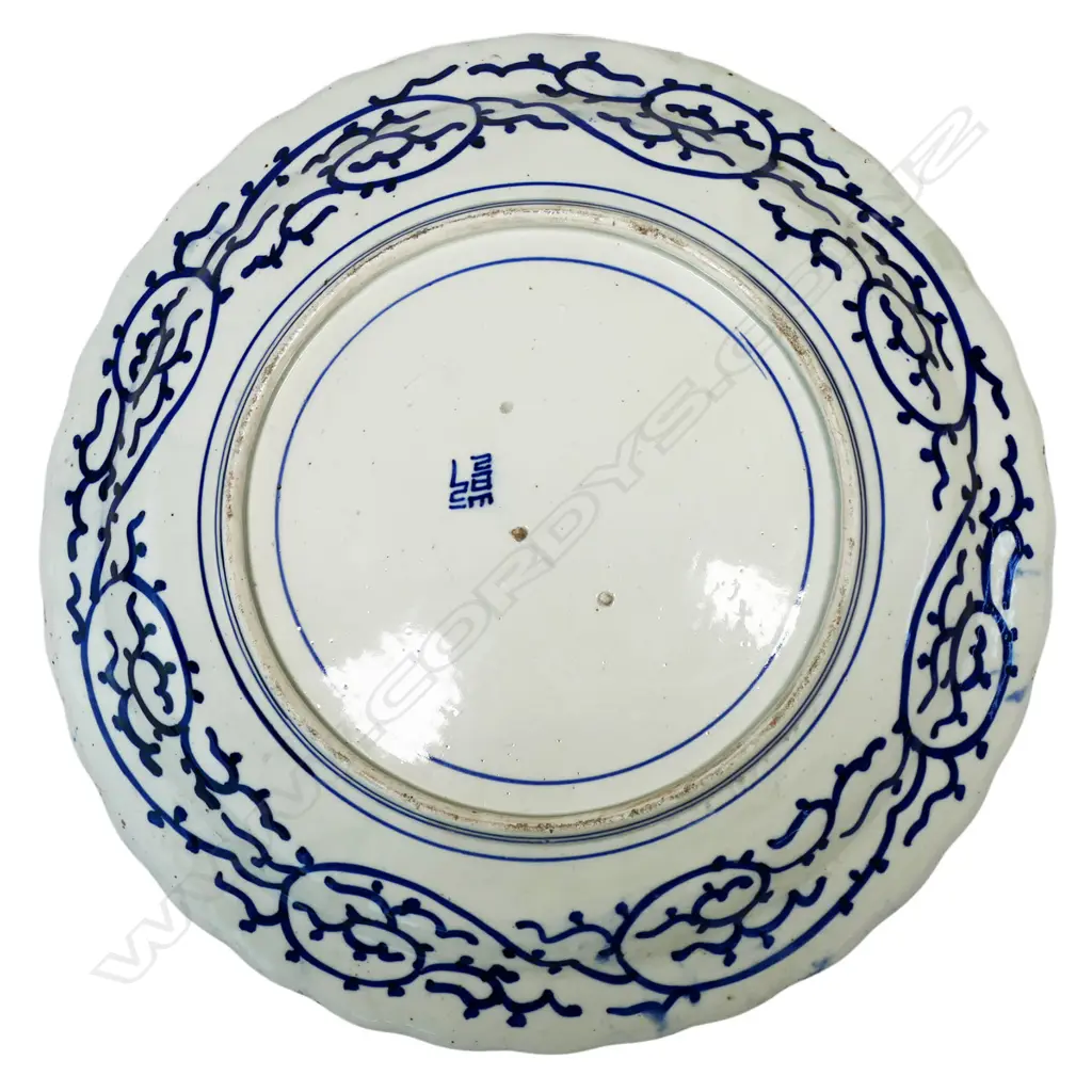 A large 19thC Japanese Meiji graphic blue and white decorated charger, Image 1++