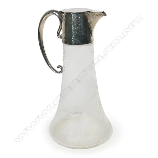 A Victorian silver and glass claret jug,