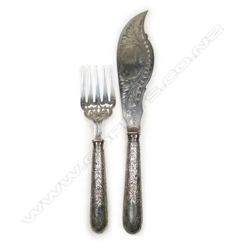 A pair of Victorian silver fishing theme engraved fish servers, Image 1++