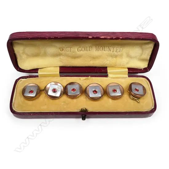A set of six 9ct gold and mother of pearl buttons,