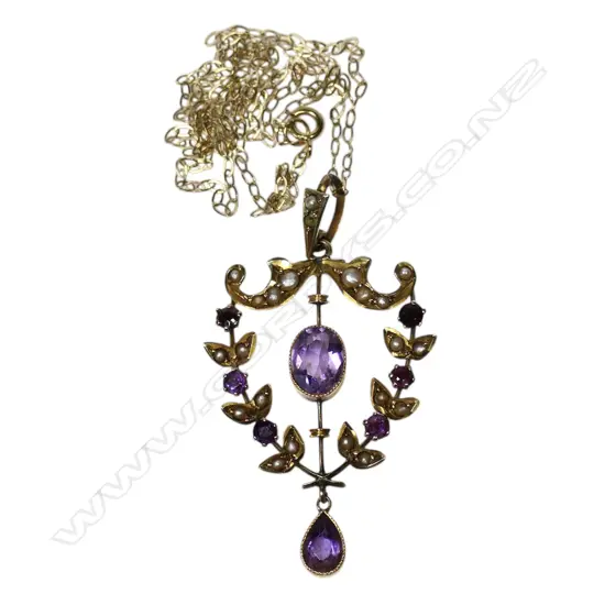 An Edwardian 9ct gold amethyst and seed pearl pendant,