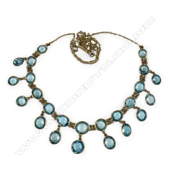 A vintage 9ct gold and blue zircon necklace,