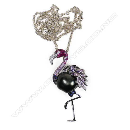 An impressive 18ct white gold and gemstone set flamingo pendant,