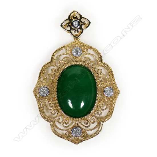 A 14ct gold jade and diamond antique style pendant,