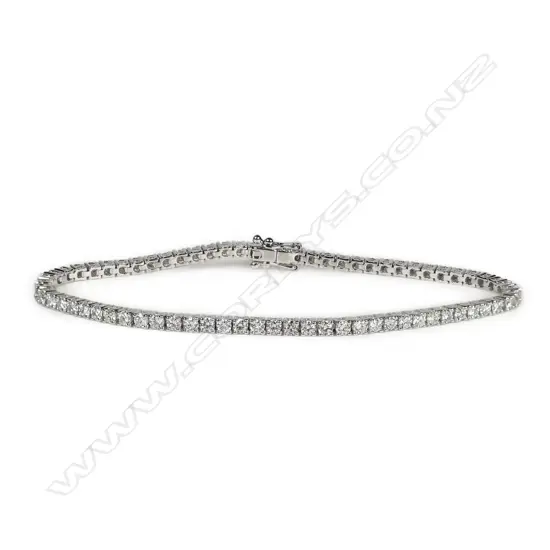 An 18ct white gold and diamond tennis bracelet,