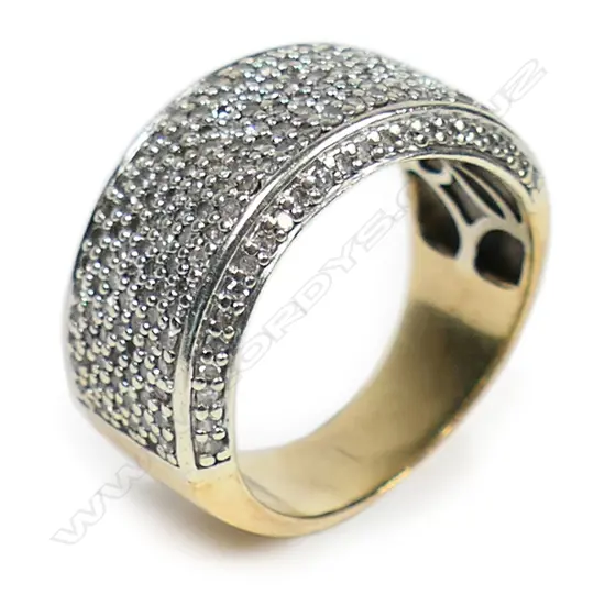 A 9ct yellow gold and multi diamond encrusted ring,