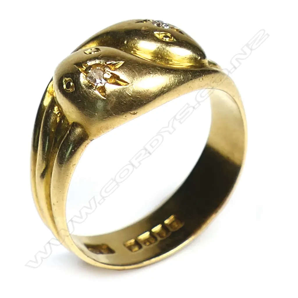 An 18ct gold and diamond snake ring, Image 1++