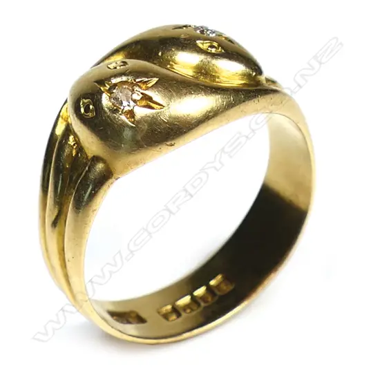 An 18ct gold and diamond snake ring,