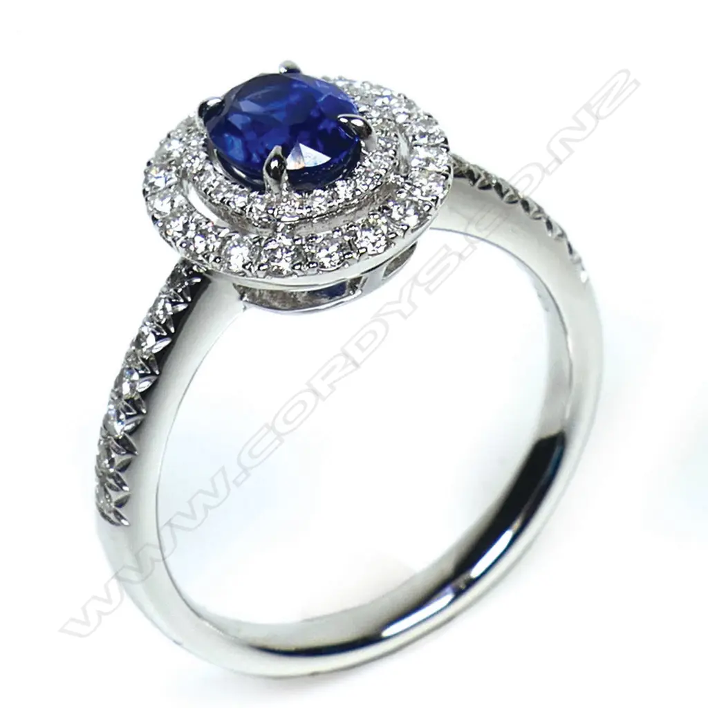 An 18ct white gold sapphire and diamond double halo ring, Image 1++