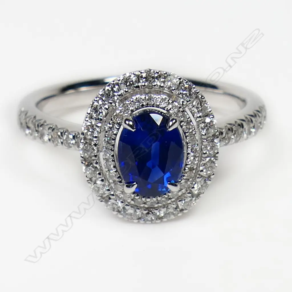 An 18ct white gold sapphire and diamond double halo ring, Image 1++