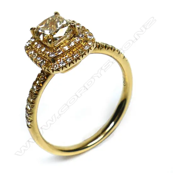 An 18ct gold and yellow diamond ring,