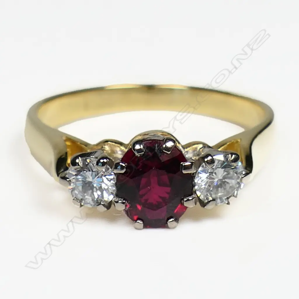 An 18ct gold ruby and diamond ring, Image 1++