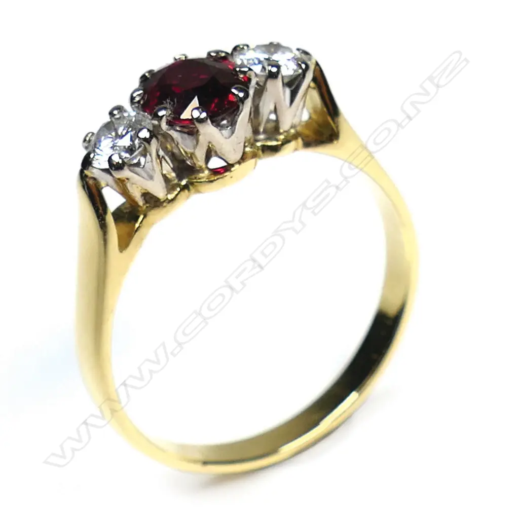 An 18ct gold ruby and diamond ring, Image 1++