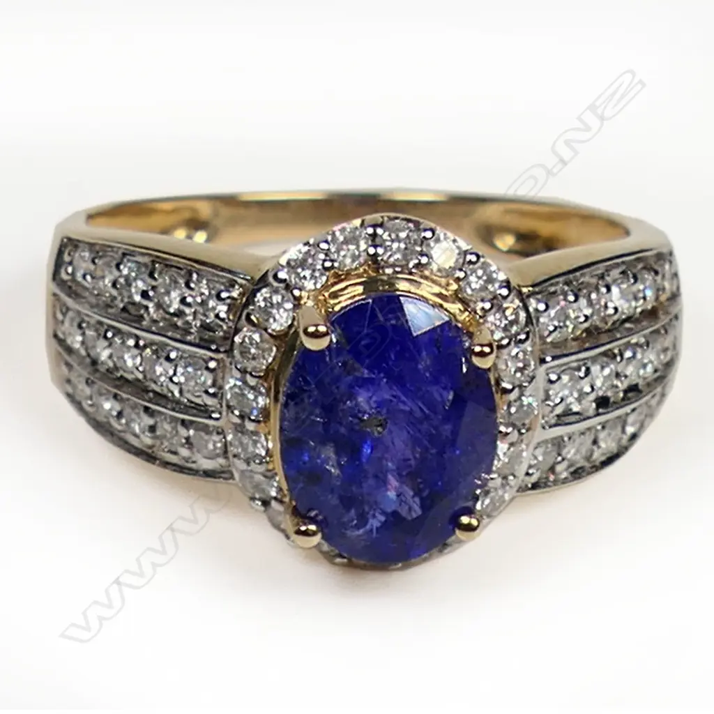 A 14ct gold tanzanite and diamond antique style halo ring, Image 1++