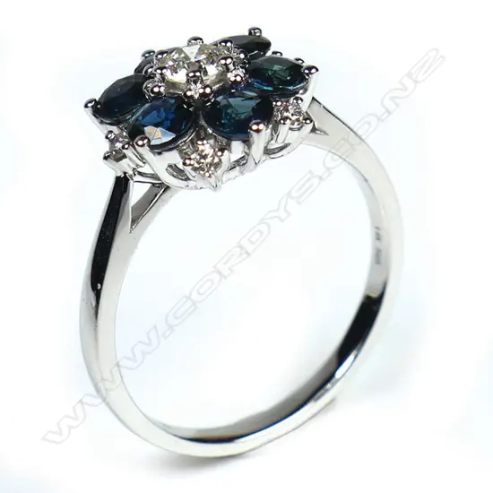 A 14ct white gold sapphire and diamond ring,