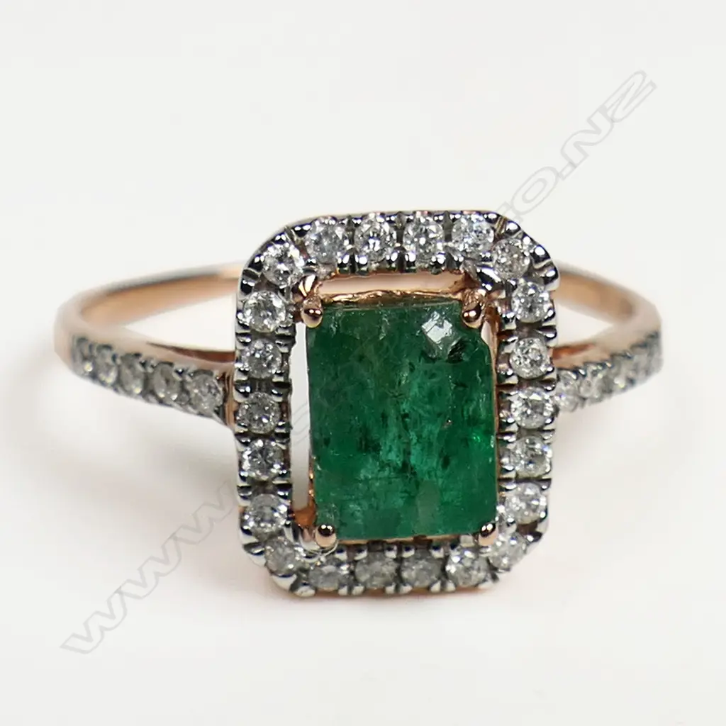 A 10ct rose gold emerald and diamond halo ring, Image 1++