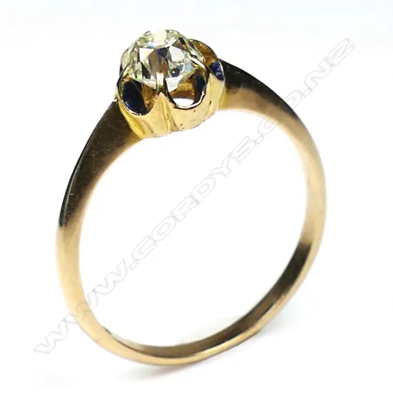 A vintage 15ct rose gold and diamond solitaire ring,