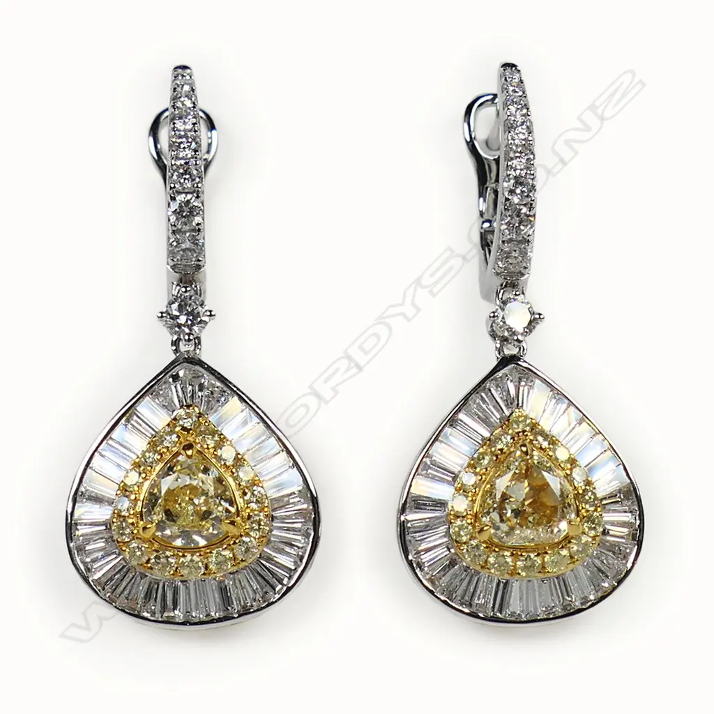 A pair of 18ct white gold yellow and white diamond earrings, Image 1++