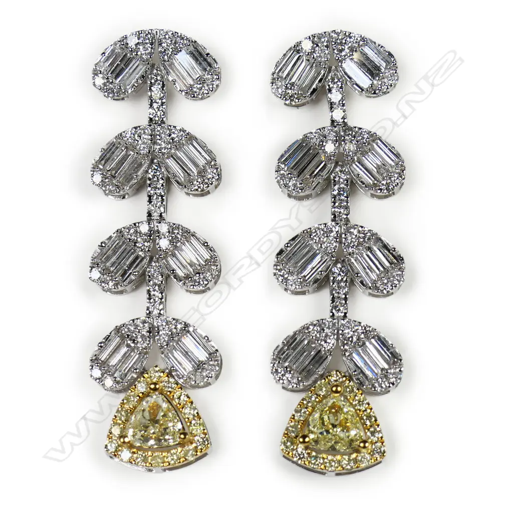A pair of 18ct white gold yellow and white diamond earrings, Image 1++