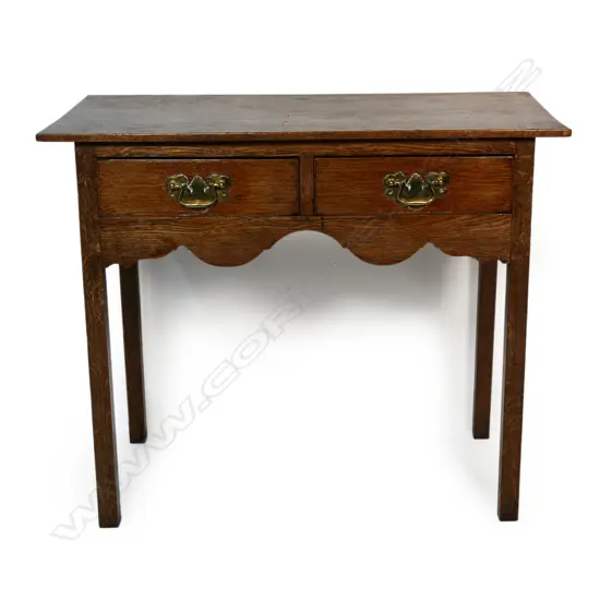 A Georgian oak lowboy,
