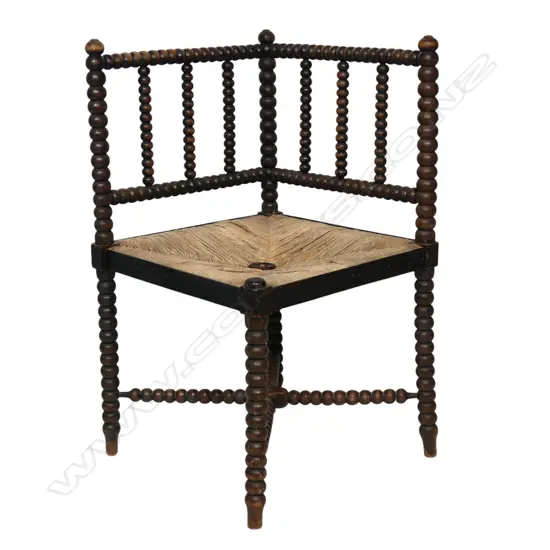 A late 19thC Arts & Crafts bobbin turned corner chair,