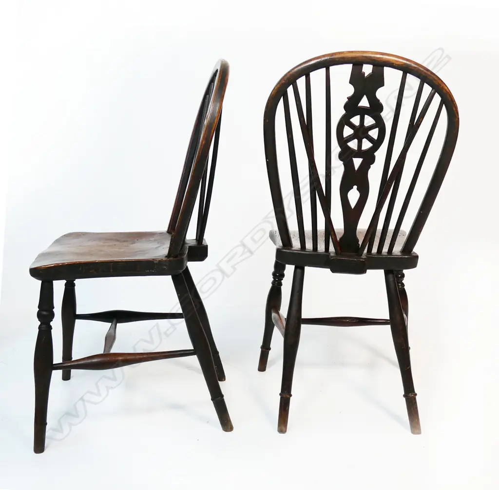 A set of four 19thC elm wheelback dining chairs, Image 1++
