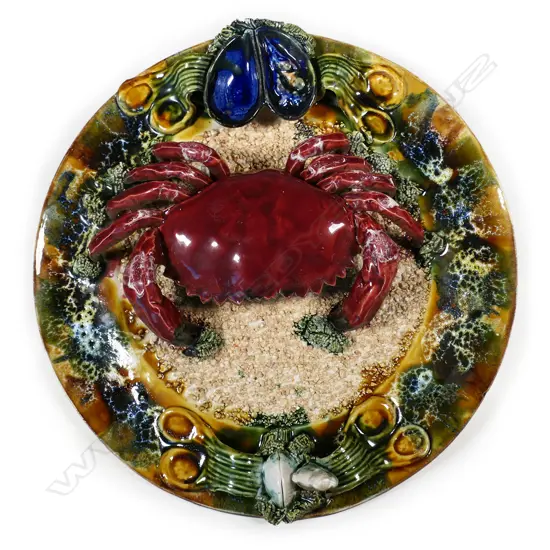 A Palissy style majolica charger,