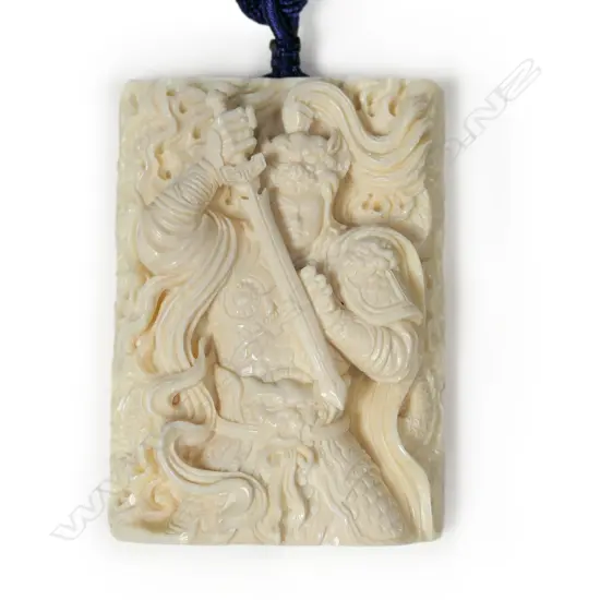 A Chinese mammoth tusk ivory carved pendant,