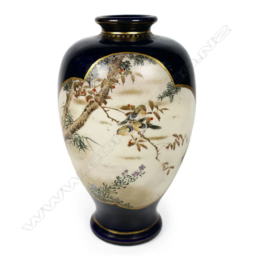A Japanese Meiji period fine Satsuma vase - with two lobed cartouches, one including processional figures, the reverse with birds in a flowering branch. Gilt highlights. Gilt marks to base. H.210mm. Image 1++