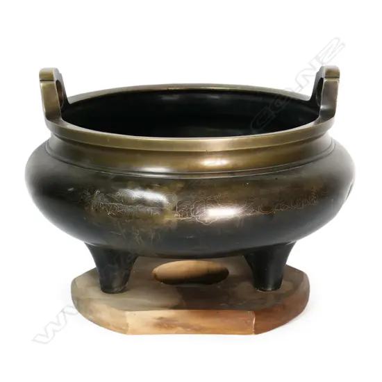 A 19thC Japanese bronze hibachi with silver wire inlay,