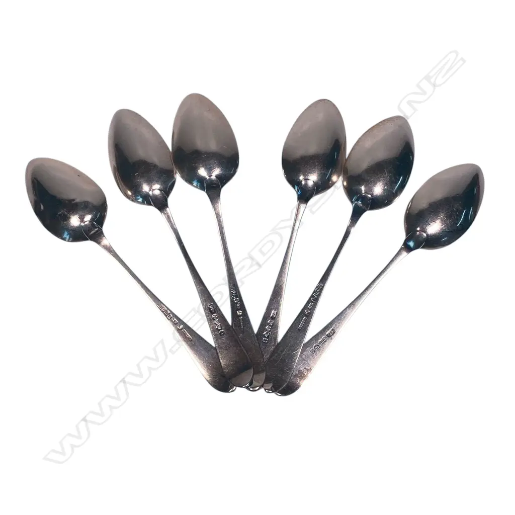 A set of six George III Scottish silver dessert spoons Celtic point pattern, crested with a raised arm holding aloft a laurel wreath and 'VIRTUTE ET LABORE'. Edinburgh 1802 by William & Patrick Cunningham. 165gms. Image 1++