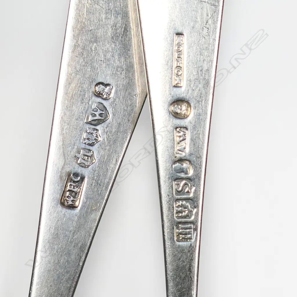 A set of six George III Scottish silver dessert spoons Celtic point pattern, crested with a raised arm holding aloft a laurel wreath and 'VIRTUTE ET LABORE'. Edinburgh 1802 by William & Patrick Cunningham. 165gms. Image 1++