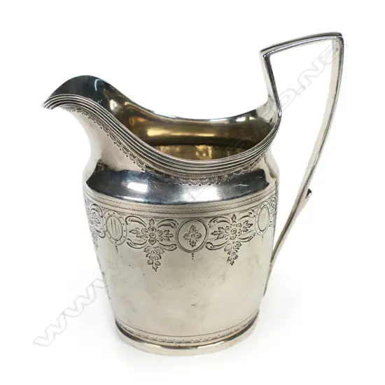 A George III silver flat bottom cream jug,