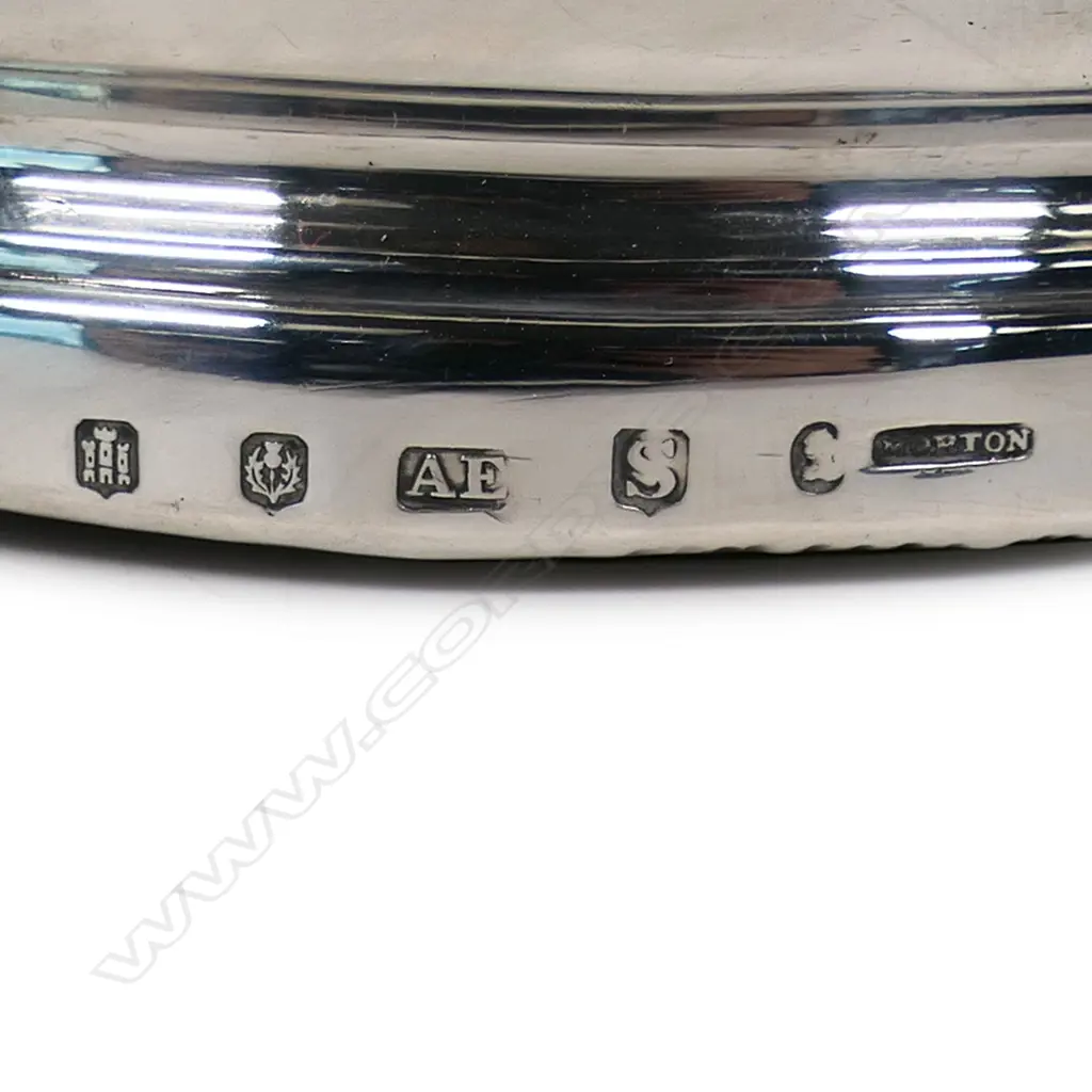 A pair of rare and impressive large silver champagne bottle coasters, Image 1++
