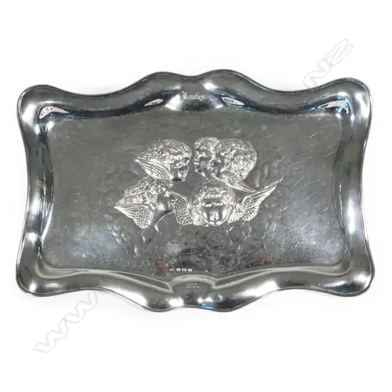An Edwardian silver serpentine dressing table tray,