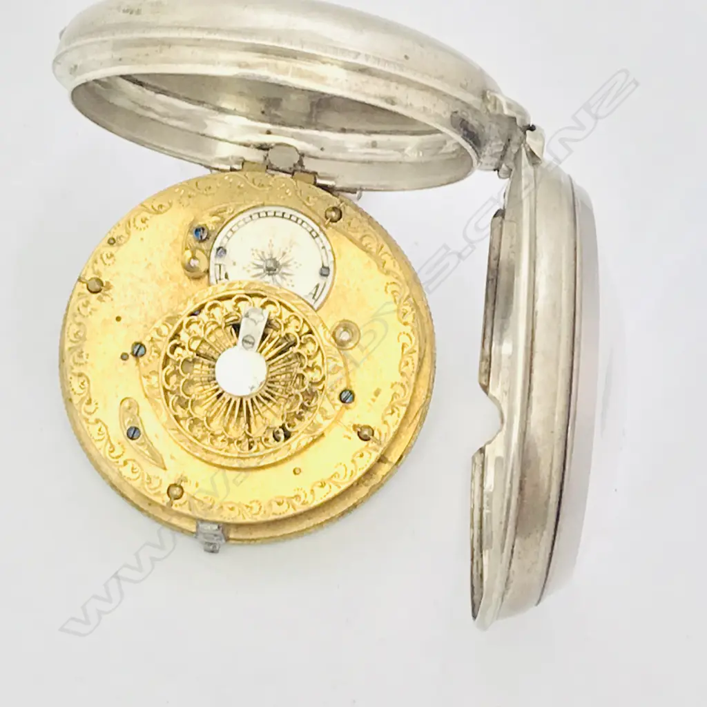 French early 19thC silver pocket watch, the case stamped DHD in a diamond with number 19338. Image 1++