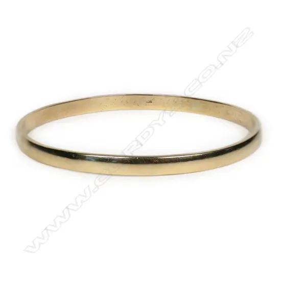 A 9ct gold bangle,