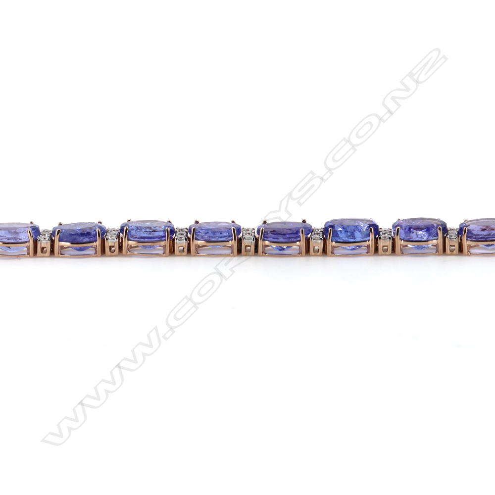 A 14ct rose gold tanzanite and diamond line bracelet, Image 1++