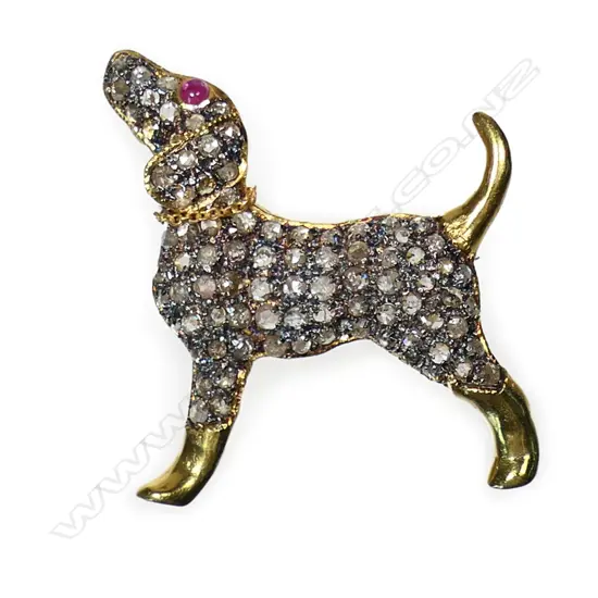 An antique style 9ct gold and diamond dog brooch,