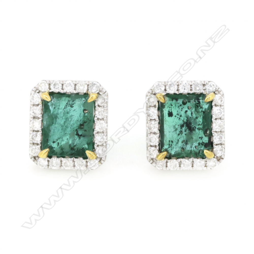 A pair of 14ct white gold emerald and diamond halo stud earrings, Image 1++