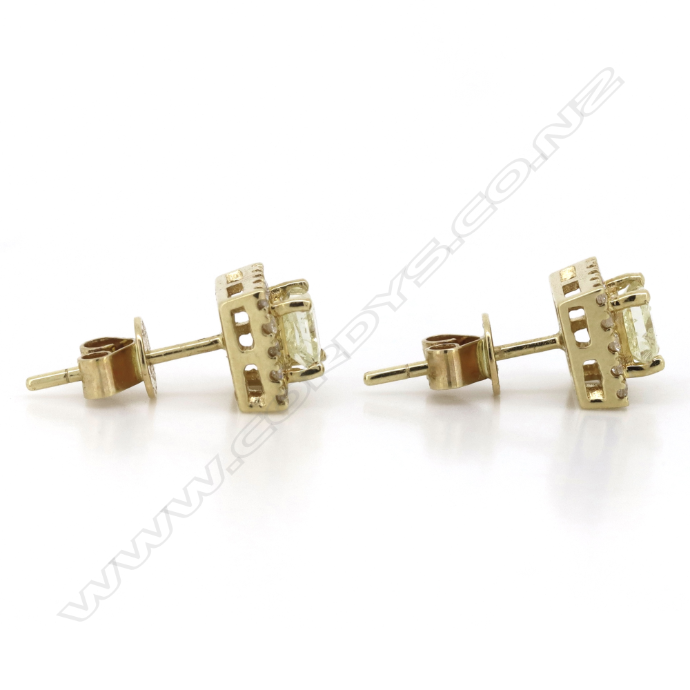 A pair of 14ct gold yellow diamond halo stud earrings, Image 1++