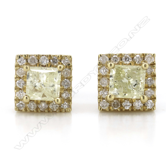 A pair of 14ct gold yellow diamond halo stud earrings,