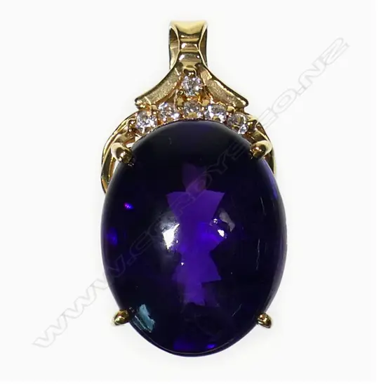 An 18ct gold amethyst and diamond pendant,