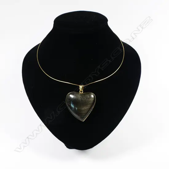 An 18ct gold and obsidian heart necklace,