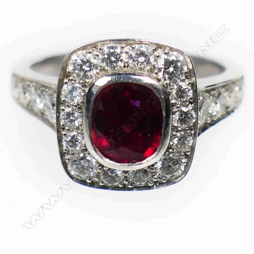 A platinum ruby and diamond cluster ring, Image 1++